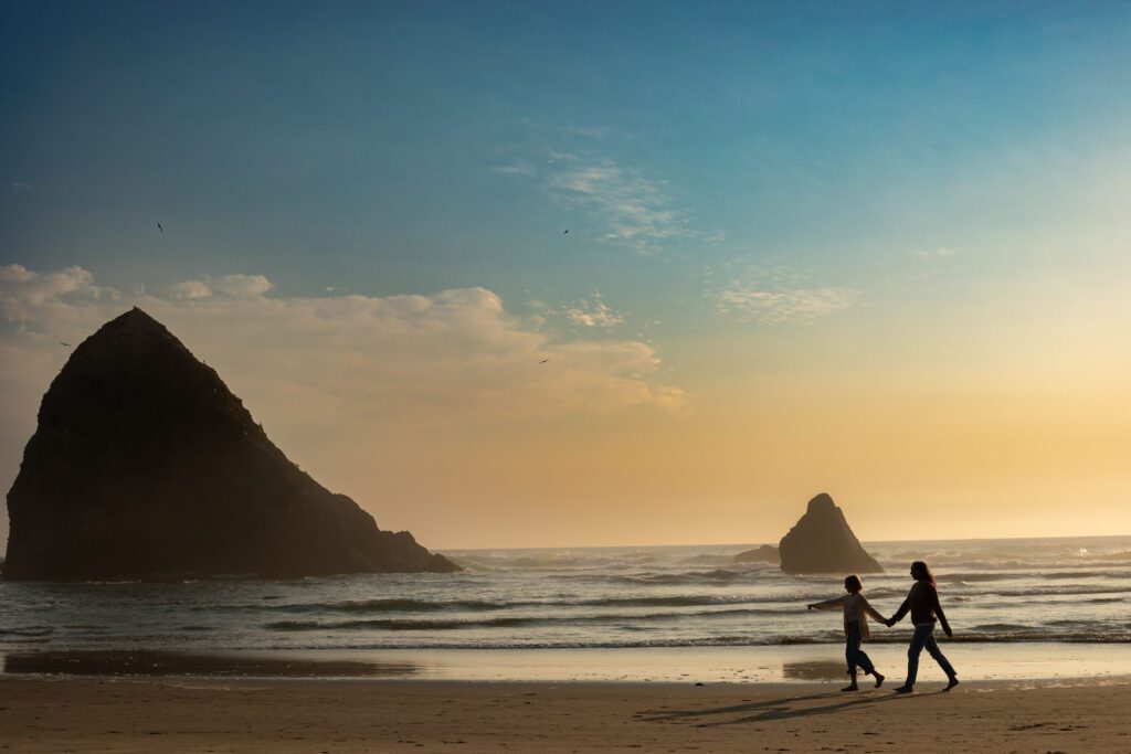 Family photo at sunset at cannon beach oregon